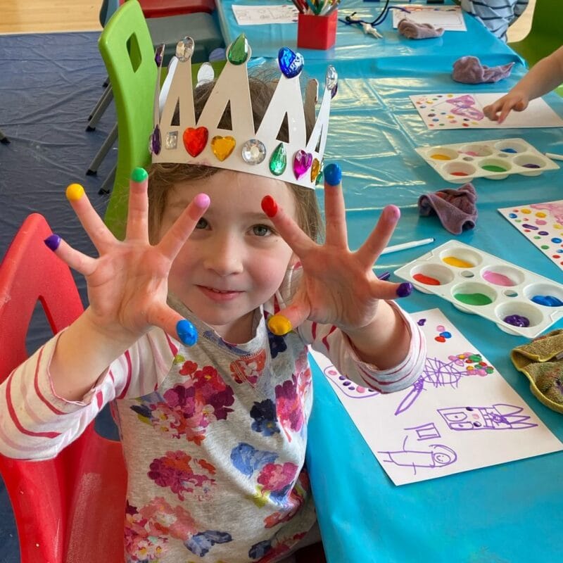 Curious child focused on a hands-on creative experiment