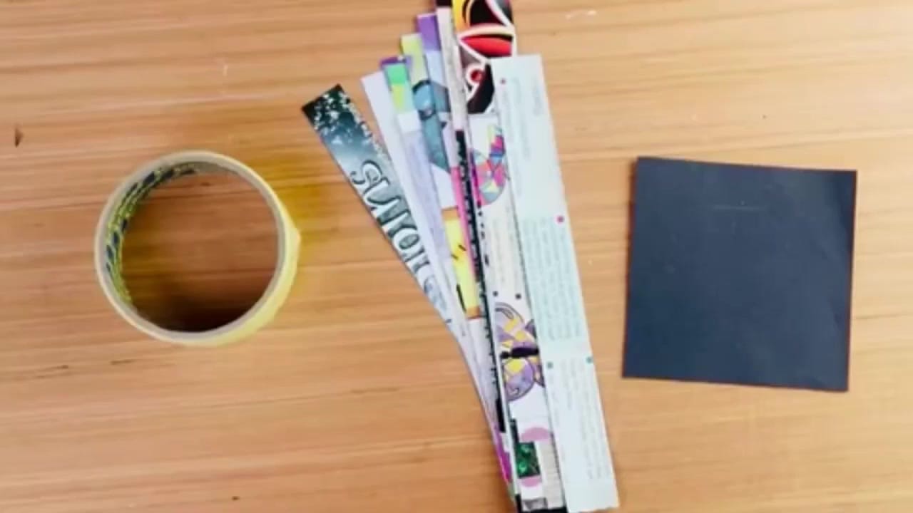 Strips of colourful magazine pages cut and ready for crafting