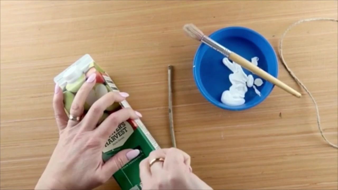 Crafting fun: turning a juice carton into a bird feeder with twig perch