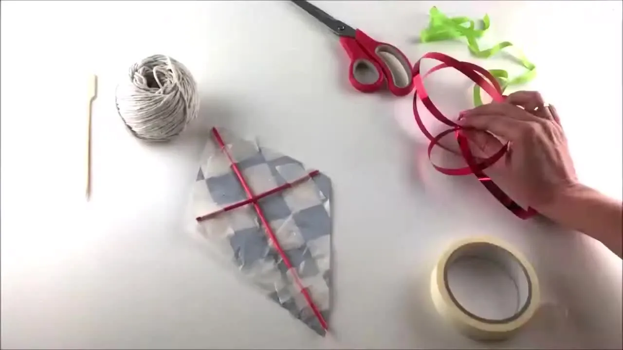 Taping sticks or straws to the back for structure and support