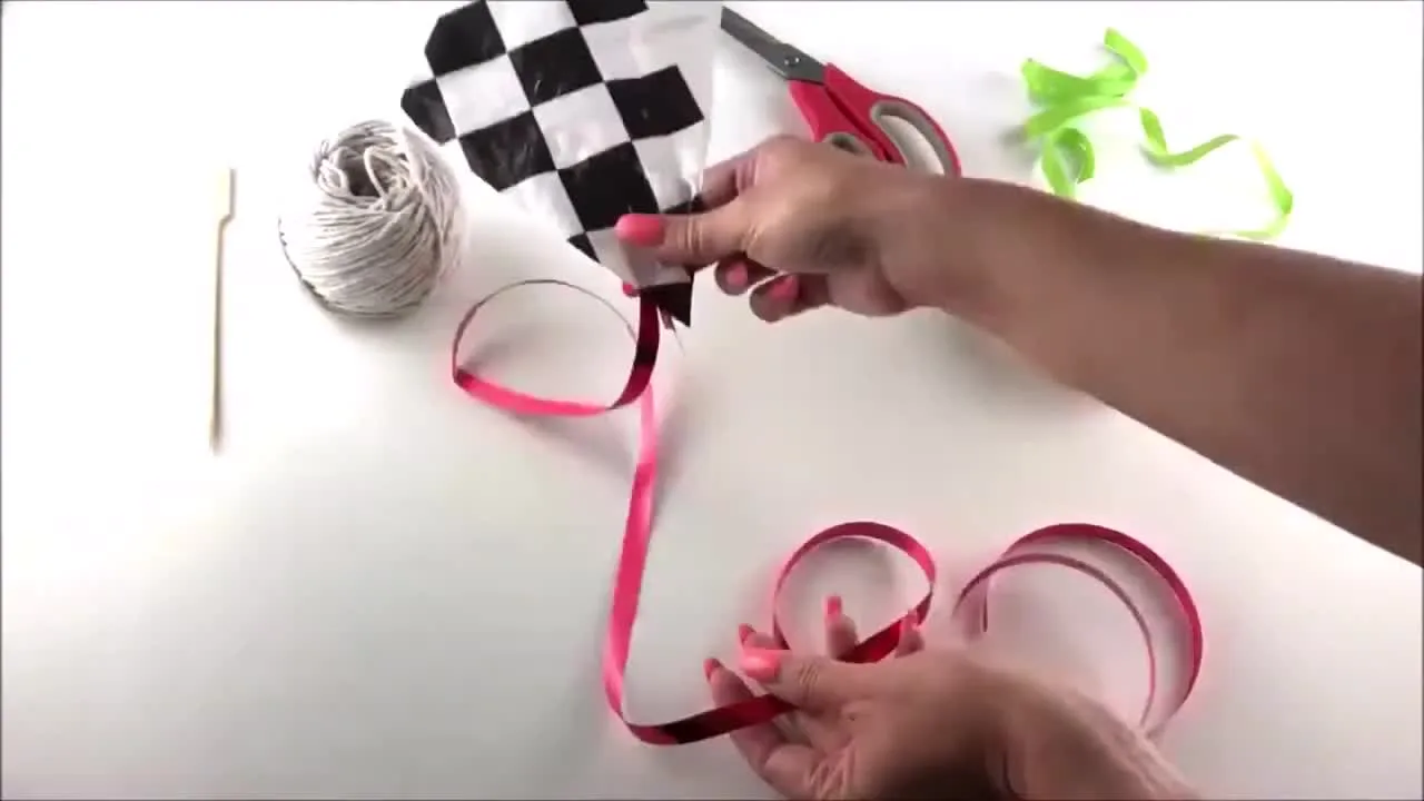 Completed eco kite made from recycled materials, ready to fly