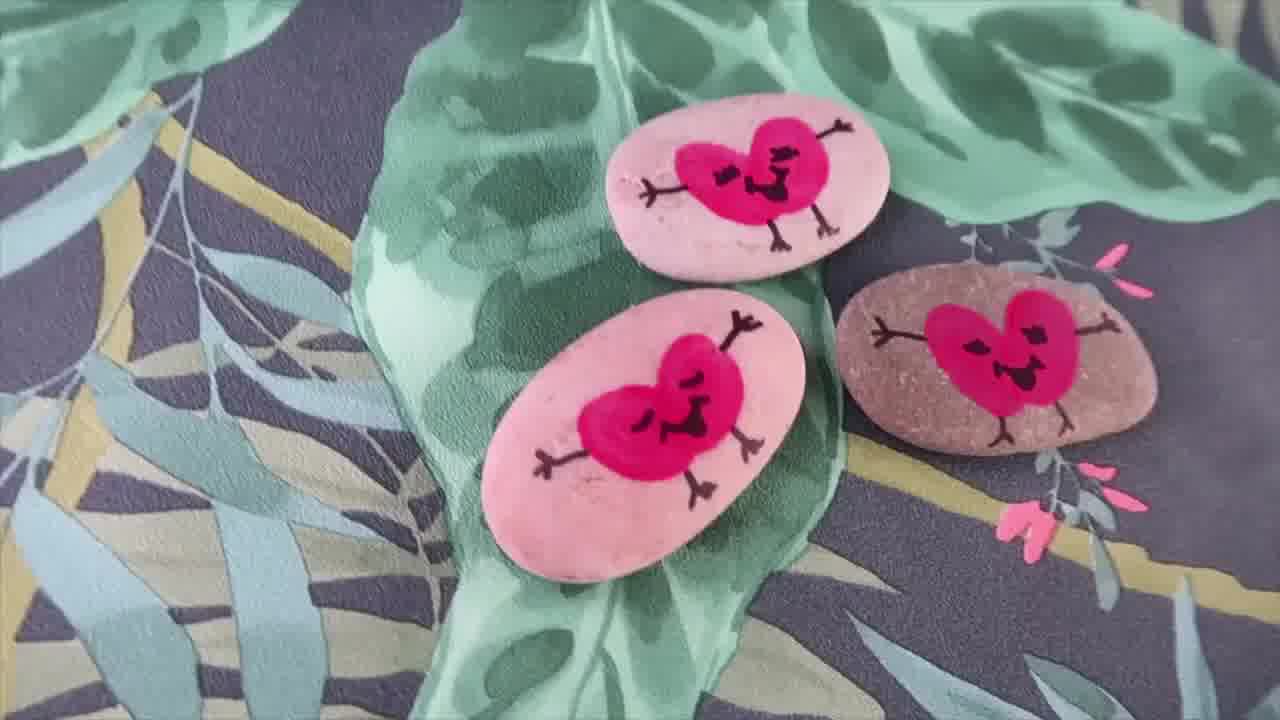 A colourful collection of painted pebbles.