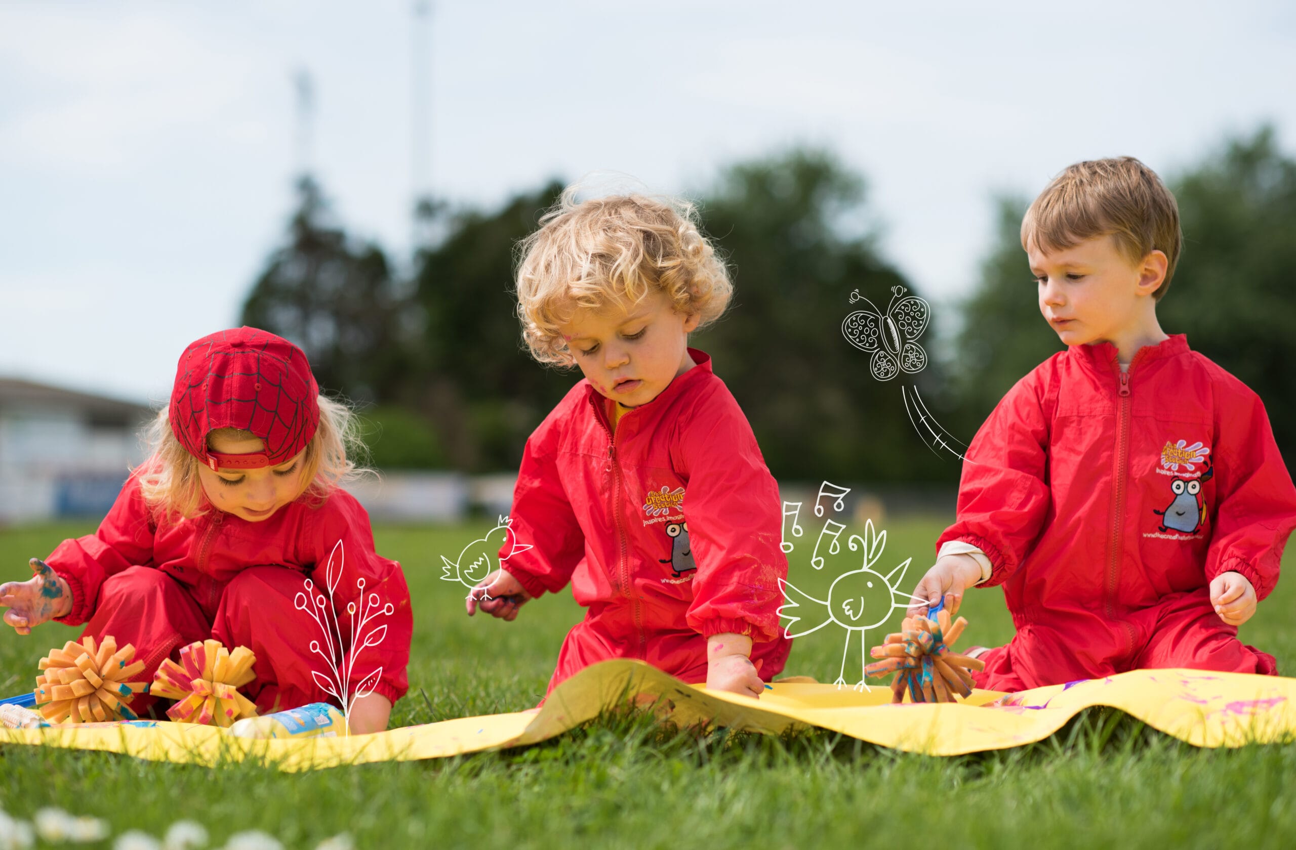 Hands-on summer fun: children exploring paint outside