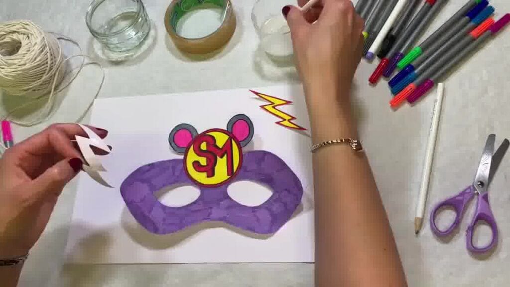 Creative superhero mask craft for kids using paper and paint