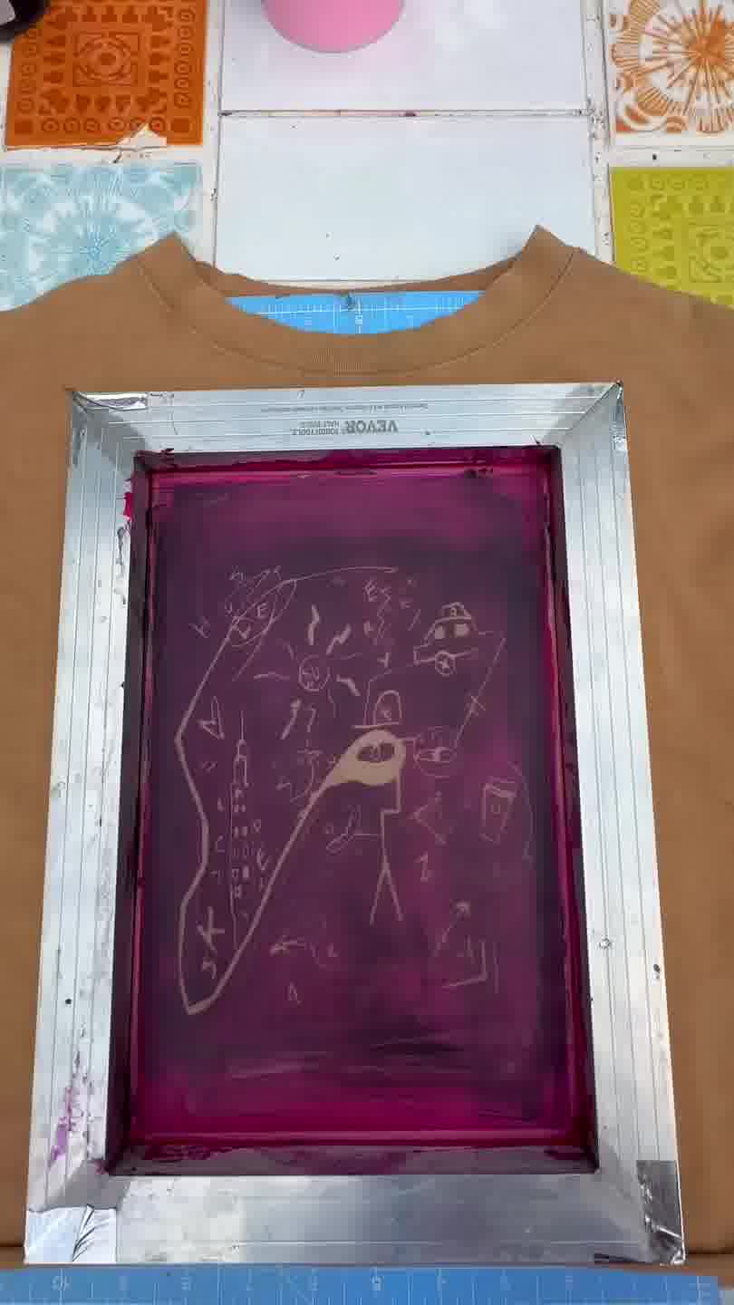 Close-up of screen printing a t-shirt design