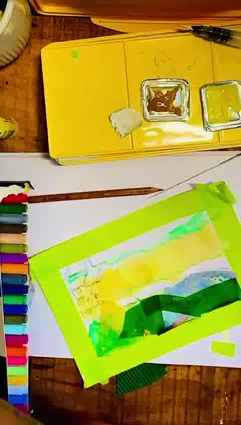 drawing a bright summer scene on the front of a blank postcard