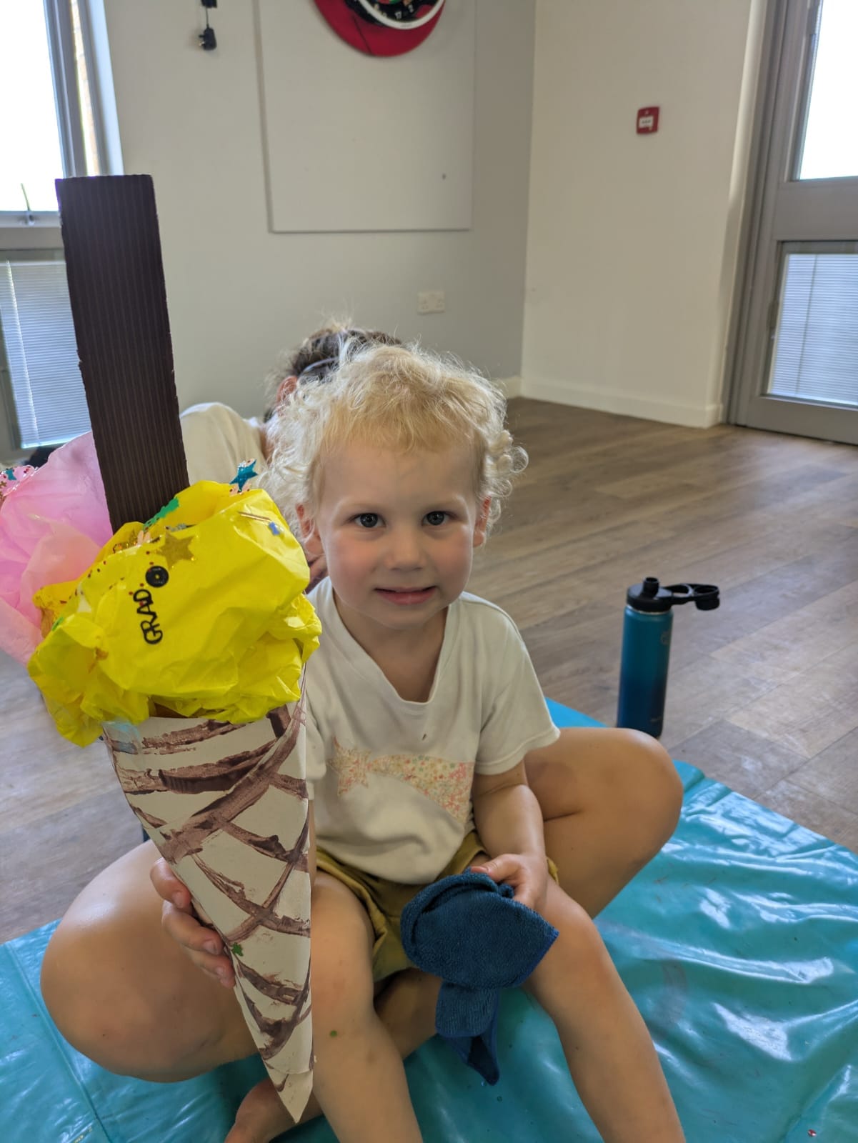 Arranged paper scoops ready to be glued onto a paper cone.