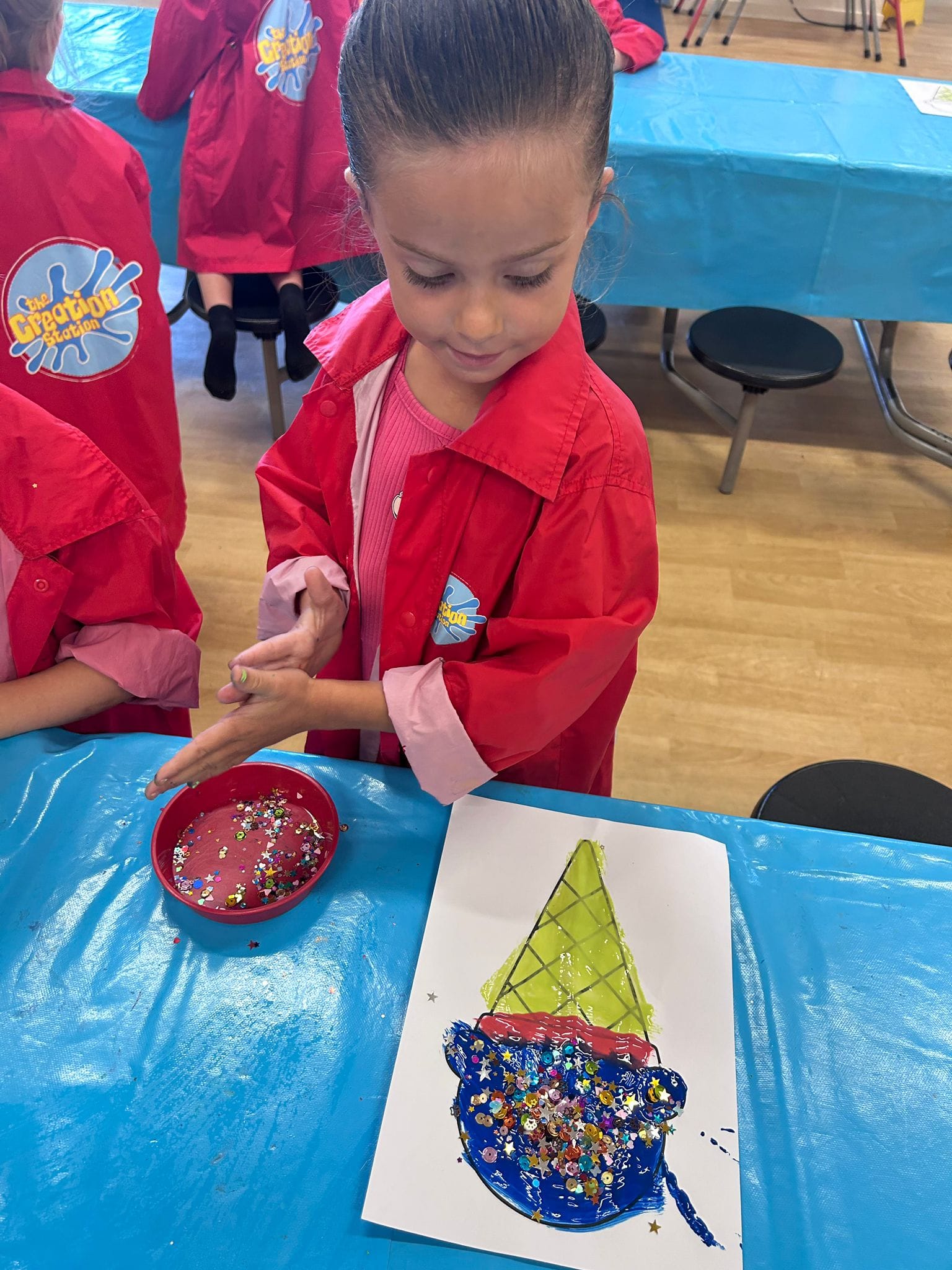 Shaving foam mixed with food colouring to make a soft, fluffy ice cream scoop