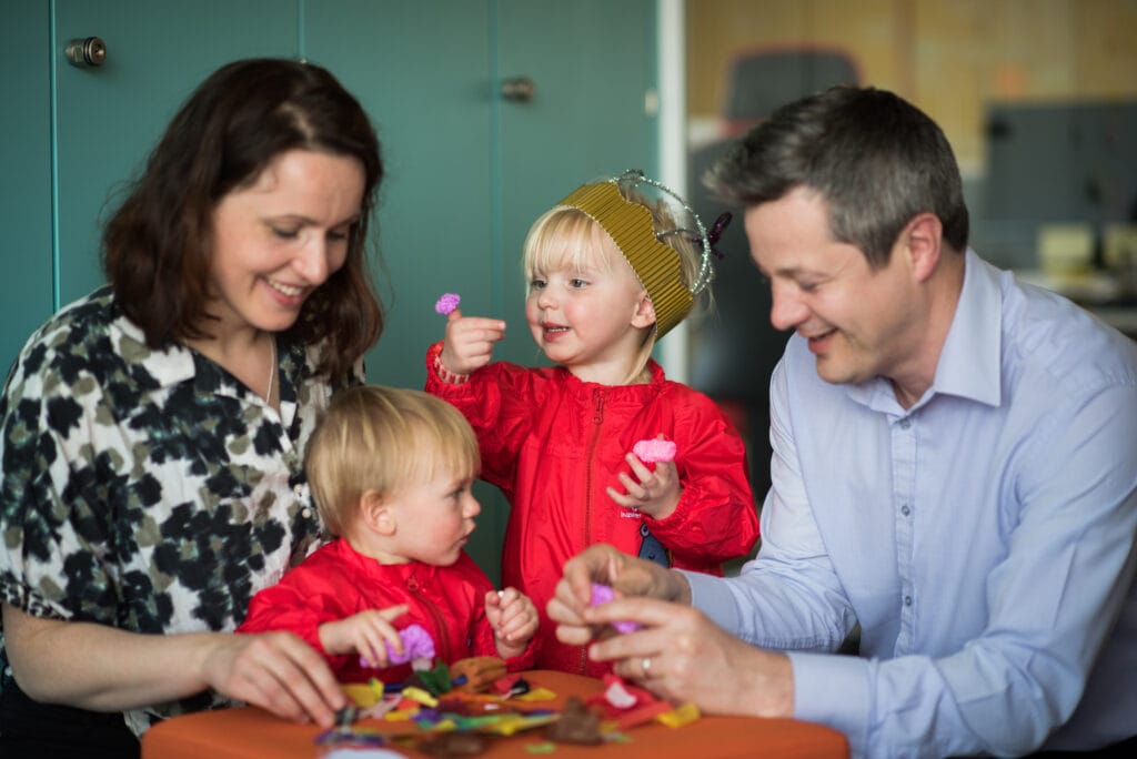 Toddlers enjoying hands-on arts and crafts activities at the Totally Tots holiday