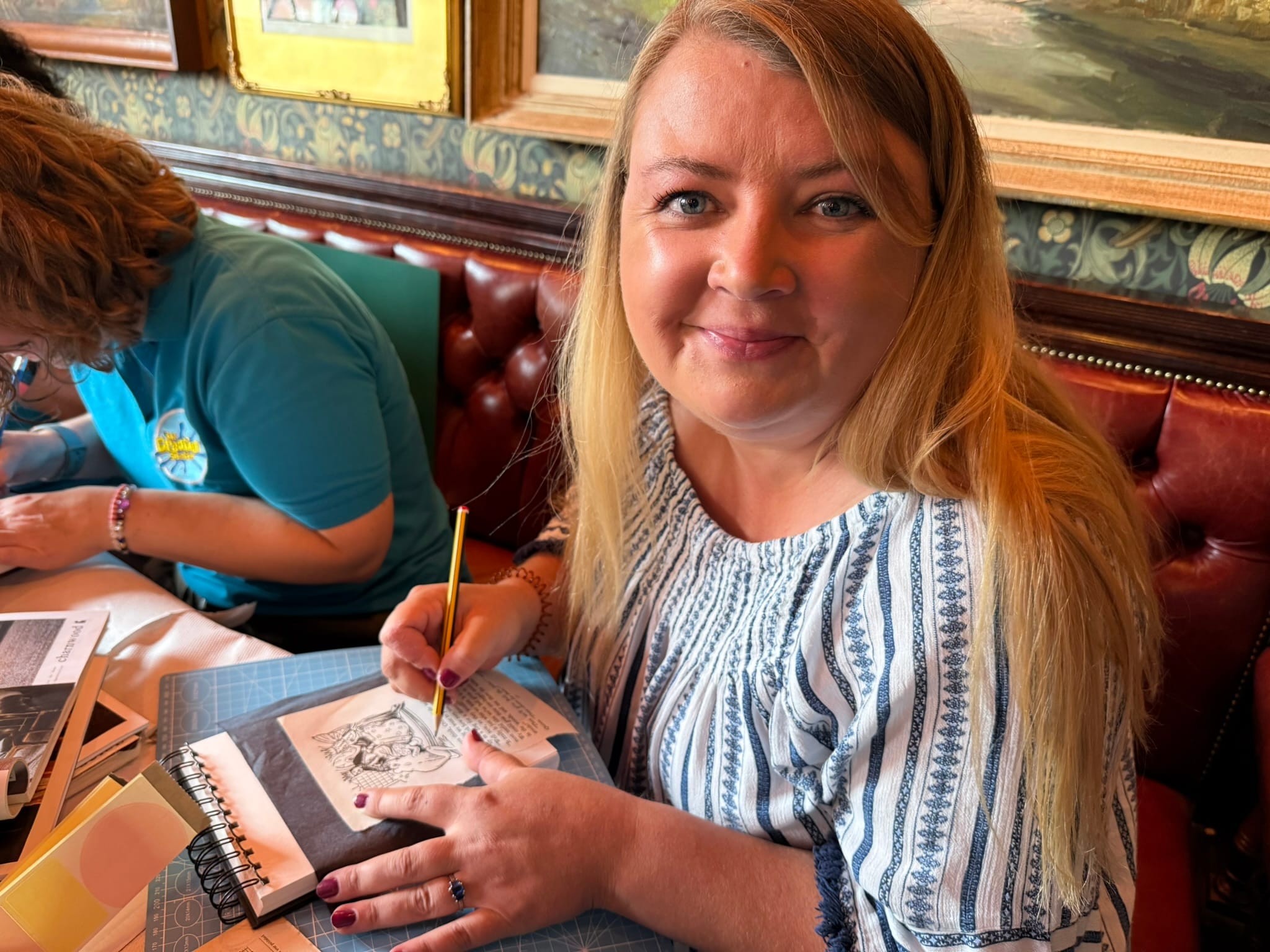 enjoying a creative activity with their craft project