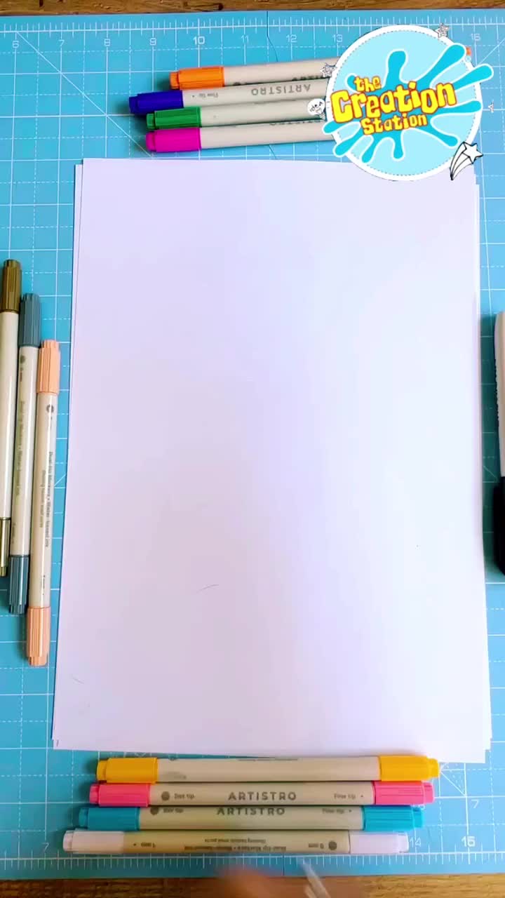 Paper, pencils, markers, and a mirror ready to start a Picasso-style self-portrait