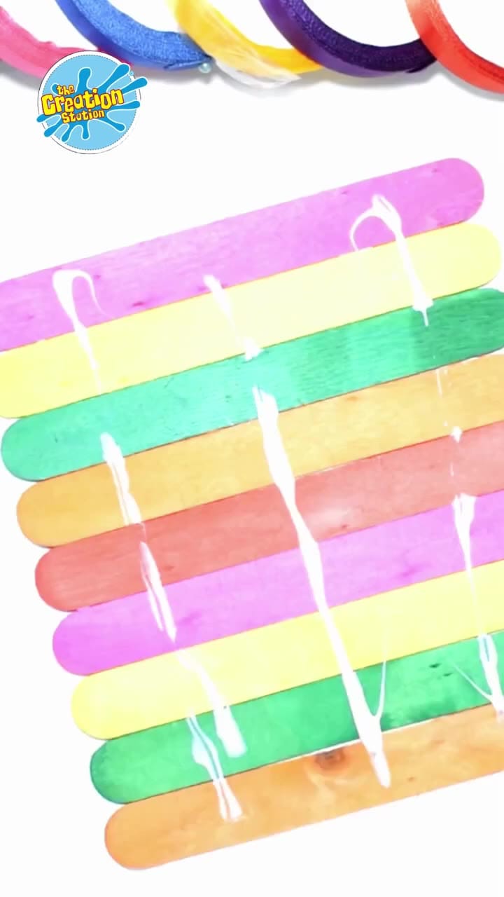 Markers and paints being used to add decorative patterns around gratitude words