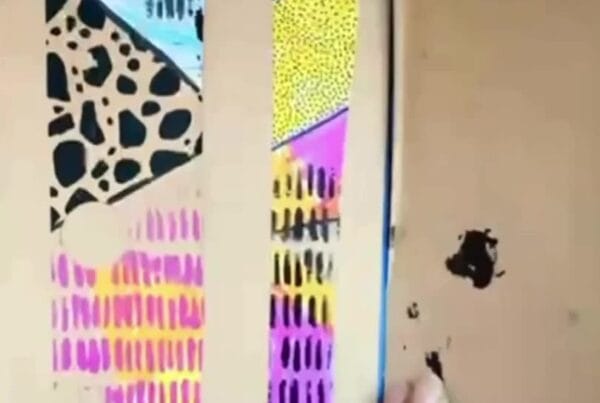 using pens, pencils, or watercolours to add colour and texture to pages