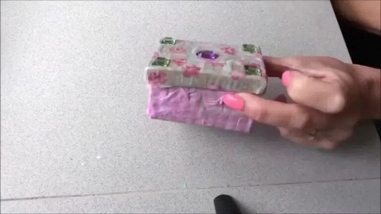 Completed decoupaged item with smooth, glossy layers and decorative patterns