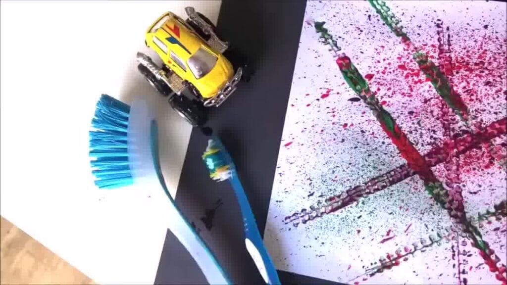 Colourful painting made with textured brushstrokes from a toothbrush